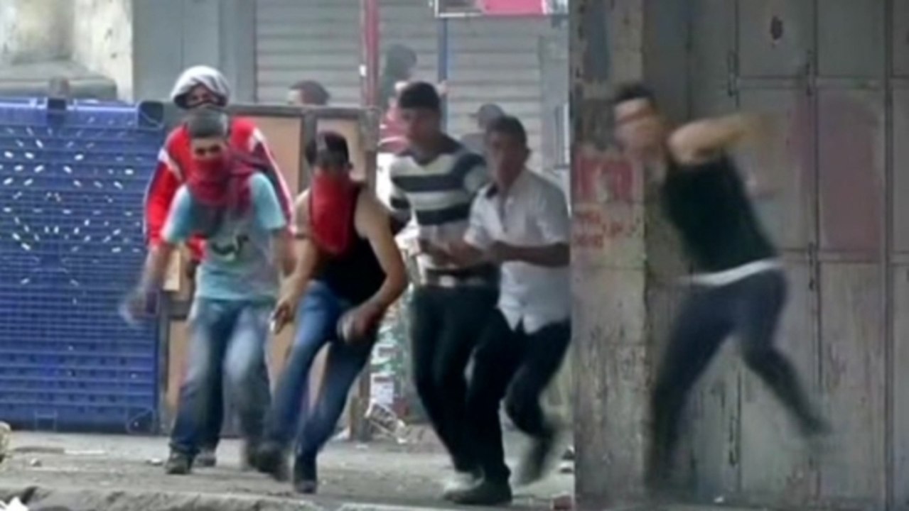 Palestinians scuffle with Israeli troops in Jerusalem, West Bank