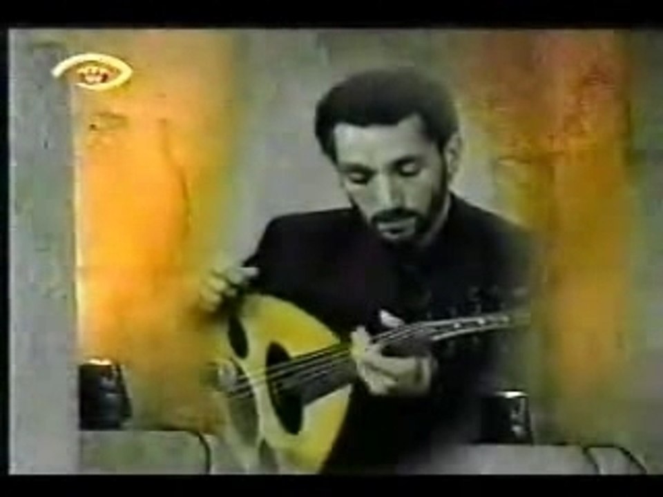 Naseer Shamma avec une main vid2