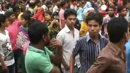 Police in Bangladesh open fire as textile workers...