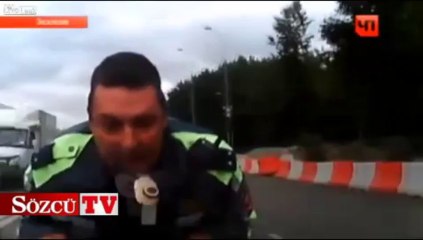 Polisi kaput üstünde gezdiren çılgın sürücü