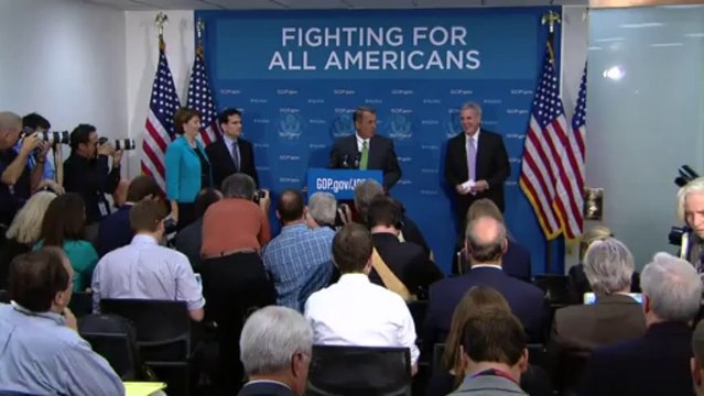 Obama raises stakes in debt, spending showdown.