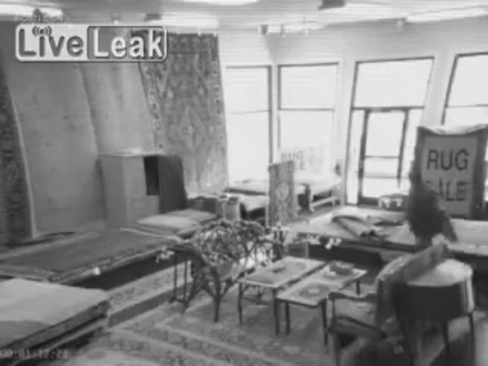 CCTV footage thief in a rug