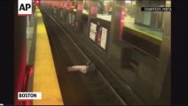 Man Rescued on Boston Subway Tracks By Riders!!