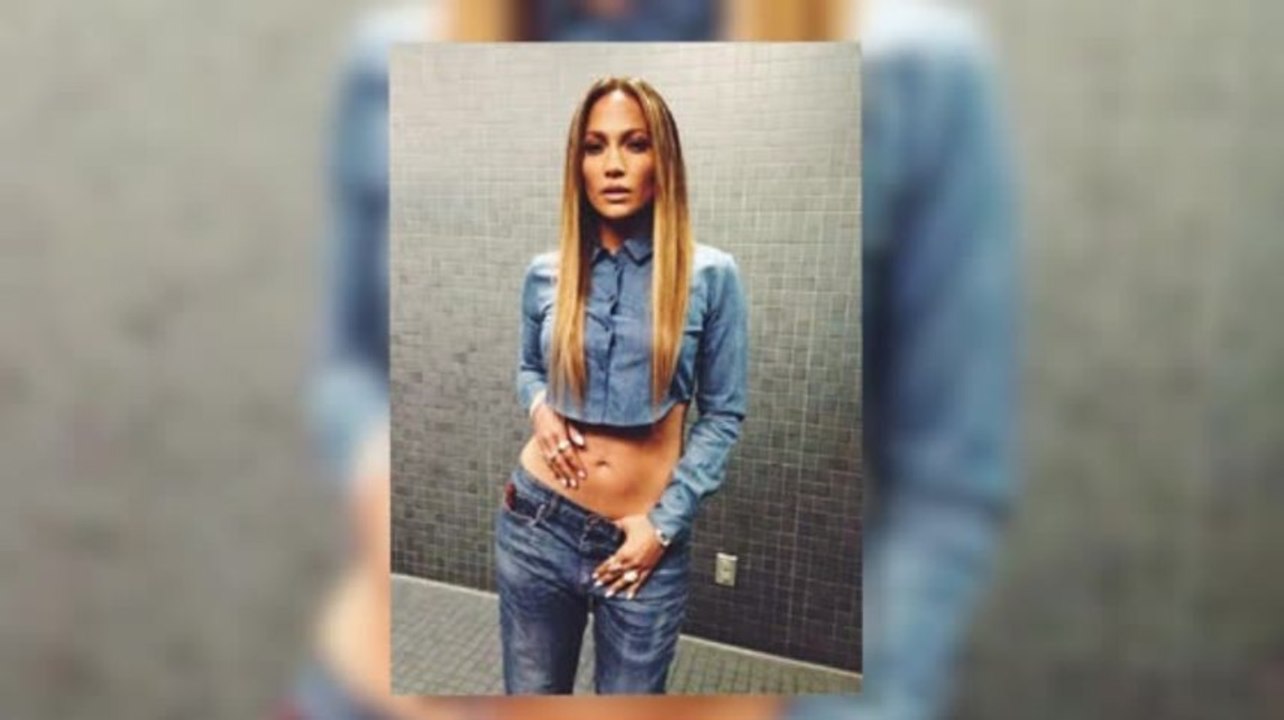 Jennifer Lopez Shows Off Her Toned Midriff in Cropped Denim Outfit
