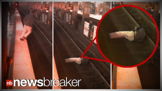 CAUGHT ON TAPE: Doctor Saved From Certain Death After Falling onto Subway Tracks