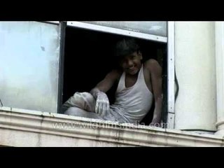 Two kids eating an ice cream and the other just dream of getting one!