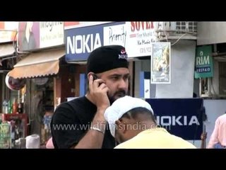 Indian man talking on mobile phone