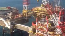 Rigworker arriving with helicopter on oil-platform