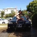 Funny FAIL trying to dance on a car. Hot but ridiculous girl!