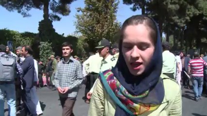 Rohani accueilli à Téhéran par partisans et adversaires