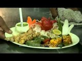 Chefs getting ready to serve meal: Days of the Raj restaurant, Delhi