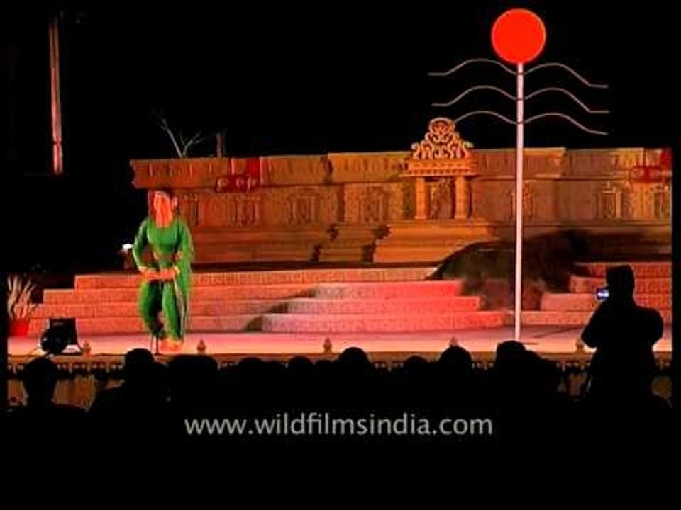 Dancers performing a dramatic act during Khajuraho Dance Festival