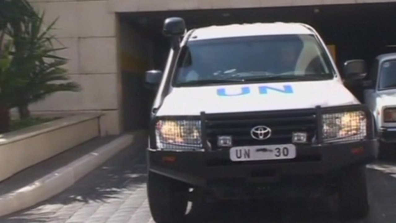 U.N. weapons inspectors leave Damascus hotel