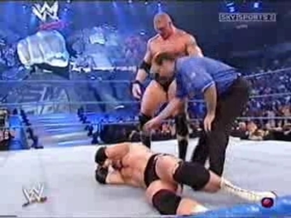 Lesnar breaks Hardcore Holly's neck