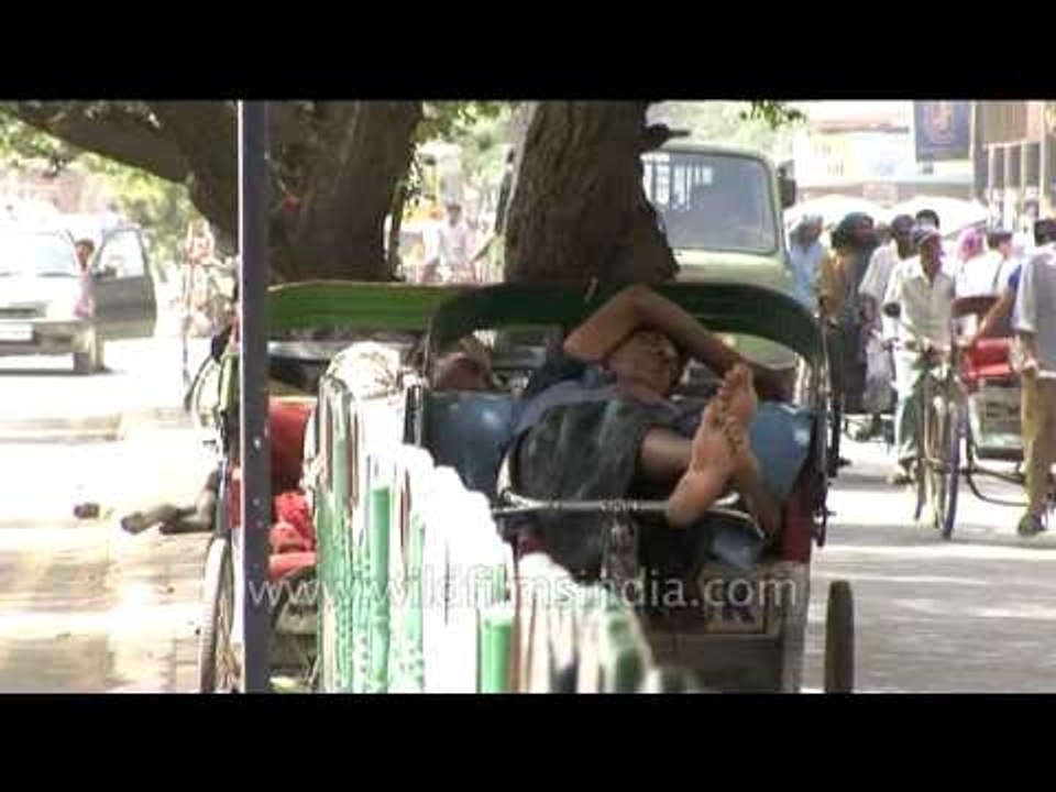 Rickshaw pullers are slumbering