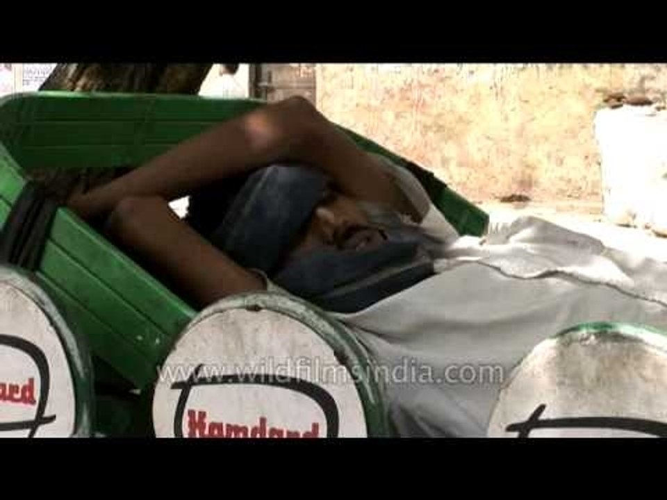 Rickshaw-puller in deep sleep!
