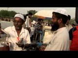 Musalman selling itter in the streets of old Delhi