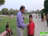 Shakeel Anjum of Jeevey Pakistan talking with young kid in Gulshan e Iqbal Park Lahore.