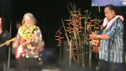 A euphoric man dancing at a concert