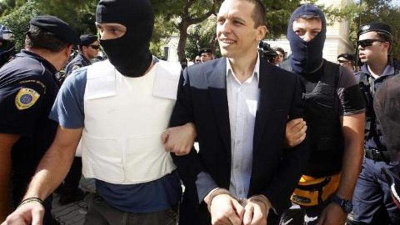 Greek neo-Nazi MPs face court charges