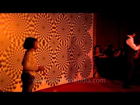 Magician performing tricks : at Dilli Haat Magic Fest