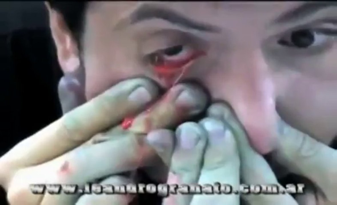 Painter SNORTS paint and SQUIRTS it onto canvas though his Eyes