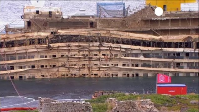 Divers find body in Costa Concordia wreck