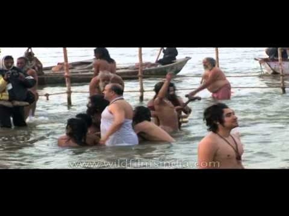 Devotees taking holy dip at Ardh Kumbh Mela