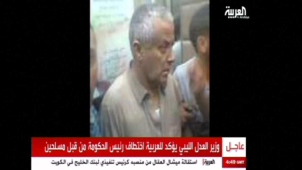 Former Libyan rebels say seized PM over al Qaeda capture