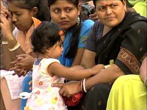 A very cute baby waving Indian flag at Indo-Pak border