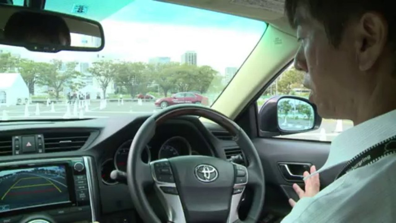 Toyota unveils cars with auto pilot