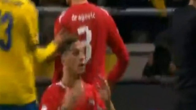 Disgusting! Johan Elmander (Sweden) fakes being headbutt to get Austria's Marko Arnautovic sent off