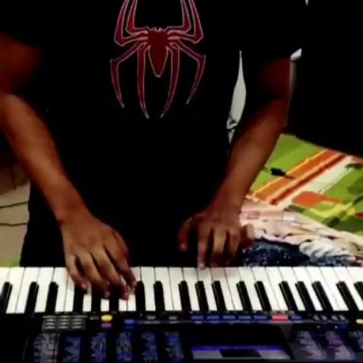 Raza playing Piano
