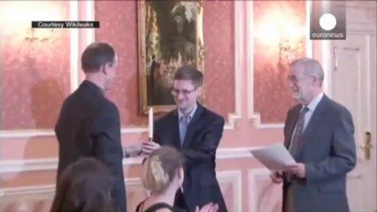 Whistleblower Snowden rewarded by ex-US intelligence...