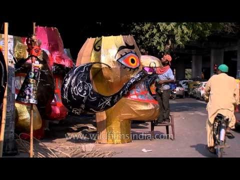 Artisans giving final touches to effigies of Ravana