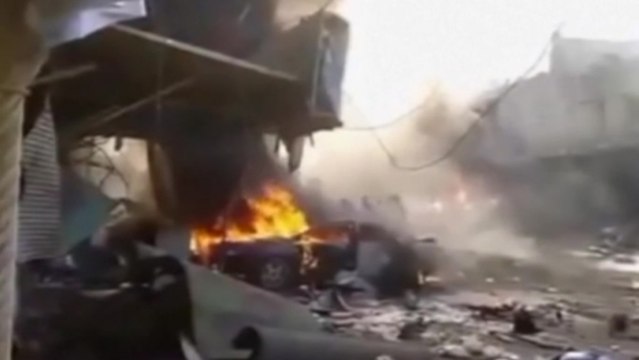 Syria blast kills at least 20 as Kerry pledges peace