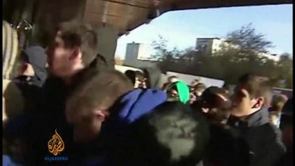 Russian police deyain migrants after race riot