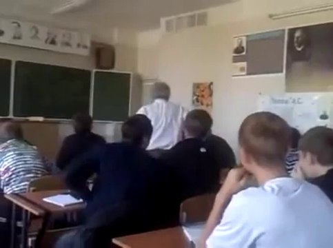 Teacher hits student at school with a large wooden stick!!