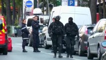 Paris bank hostage-taker surrenders, leaves building