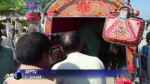 Pakistani goat markets teem with buyers before Eid