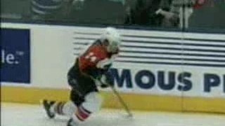 hockey - Darcy Tucker hits  Sami Kapanen