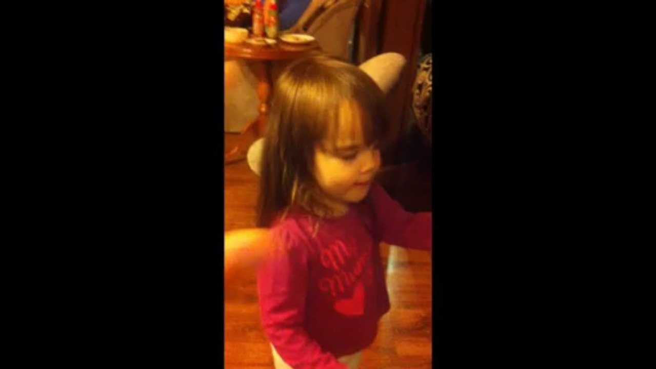 Two years old girl (not) giving high five!