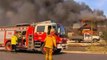 Australia bushfires destroy scores of homes