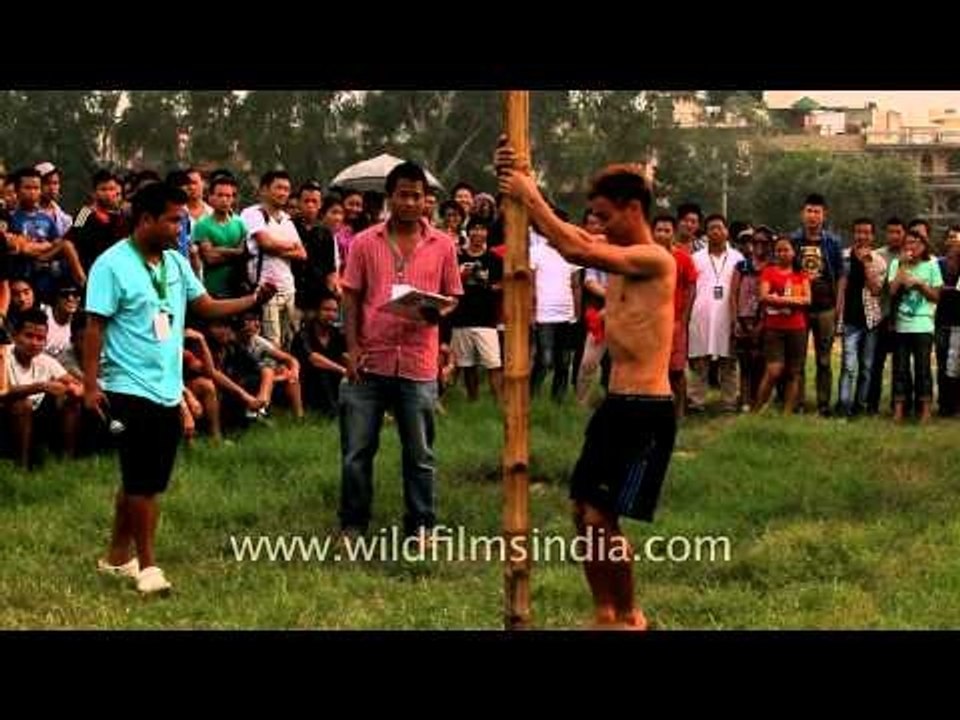 Bad start at the greased pole climbing : Naga F...