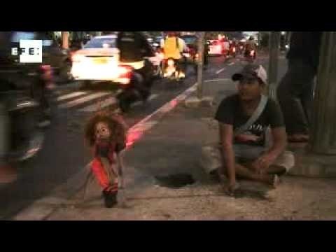 Jakarta's exploited masked monkeys