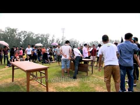 Enjoying arm wrestling at the 50th Naga Fest'13