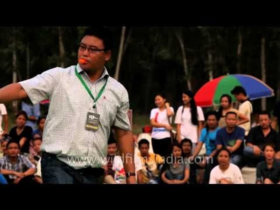 Wrestlers tying their belt at the 50th Naga Fest'13-Delhi