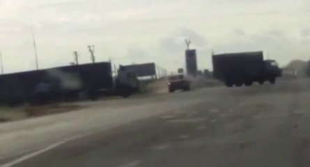 Une chaîne entre deux camions... et c'est l'accident!