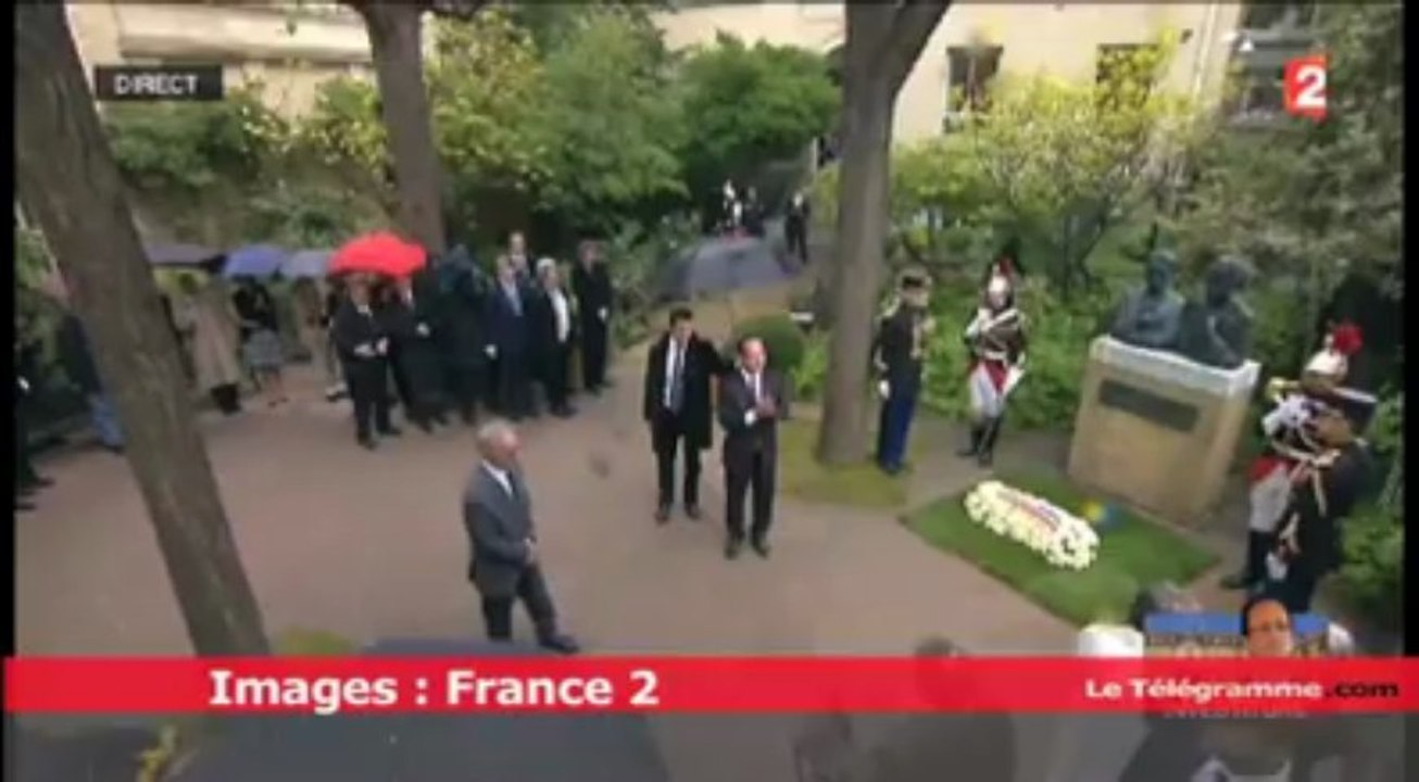Hommage à Marie Curie. François Hollande sous un déluge de pluie