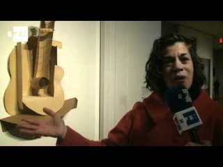 MOMA examines Picasso guitar sculptures.